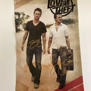 Signed Love and Theft poster